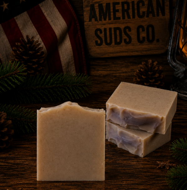 American Suds Co. handcrafted cold processed soap bar with mountain top design, tan color, and a santal almond cream scent.
