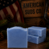 American Suds Co. handcrafted cold processed soap bar with mountain top design, tan color, and a fresh clean scent.