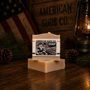 American Suds Co. handcrafted cold processed soap bar with mountain top design, tan color, and a santal almond cream scent.